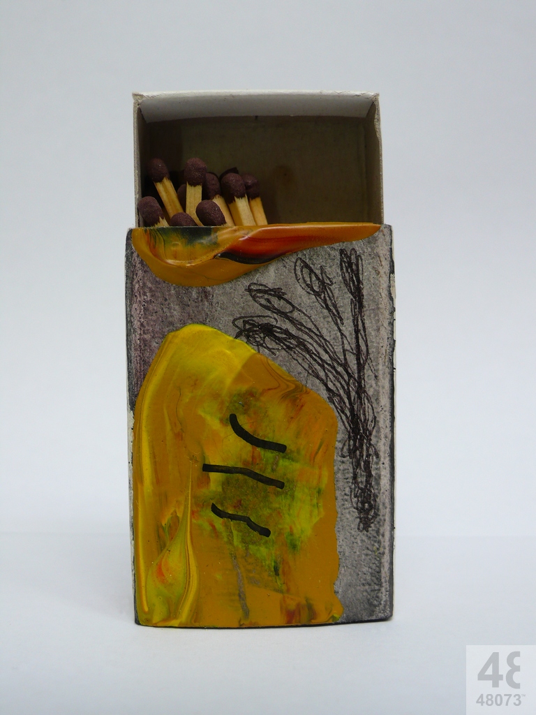 Small abstract painting on matchbox.