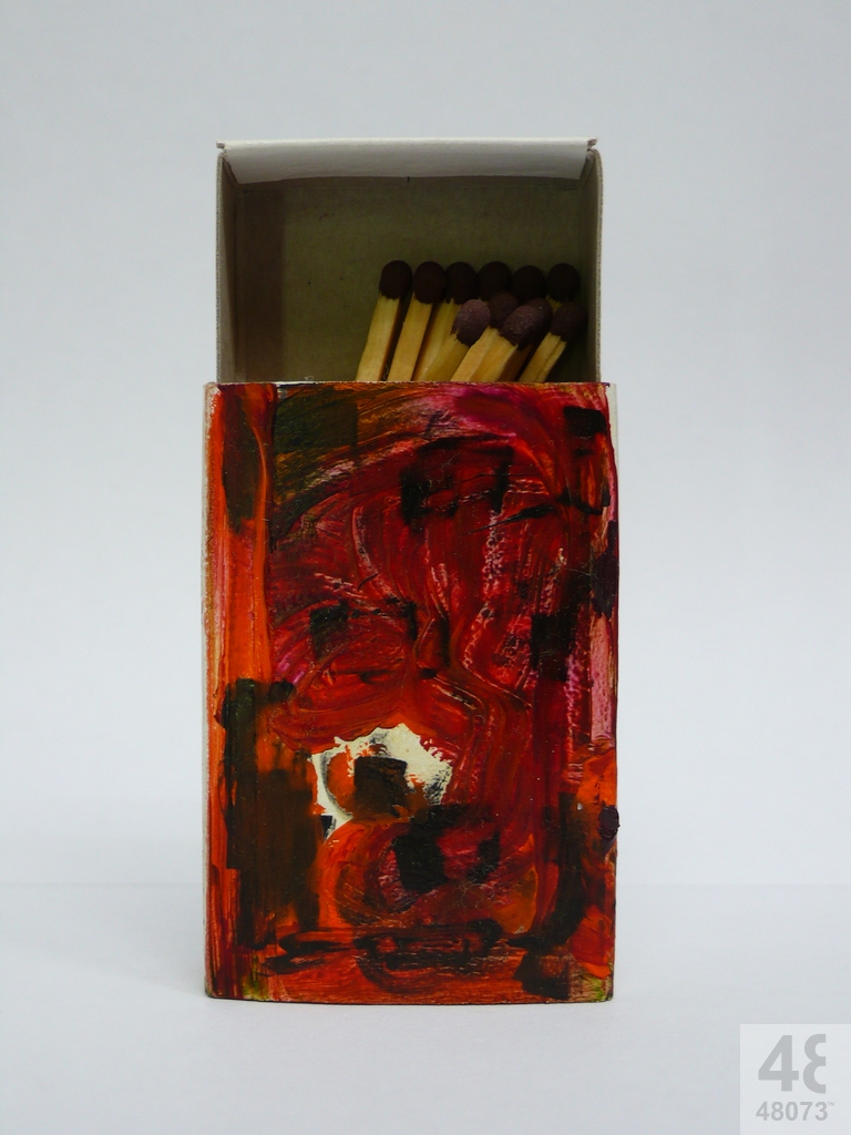 Small abstract painting on matchbox.