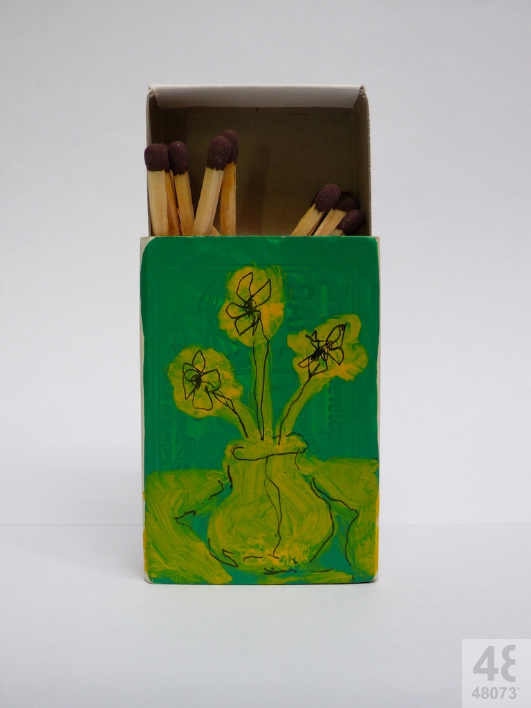 Small abstract painting on matchbox.