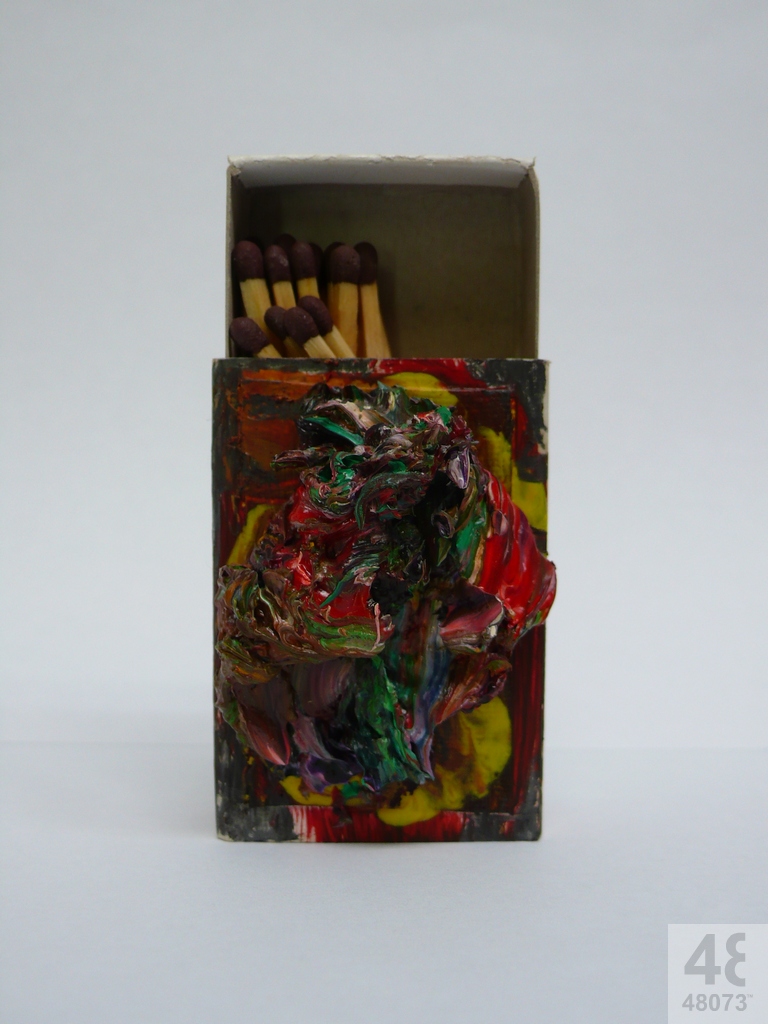 Small abstract painting on matchbox.