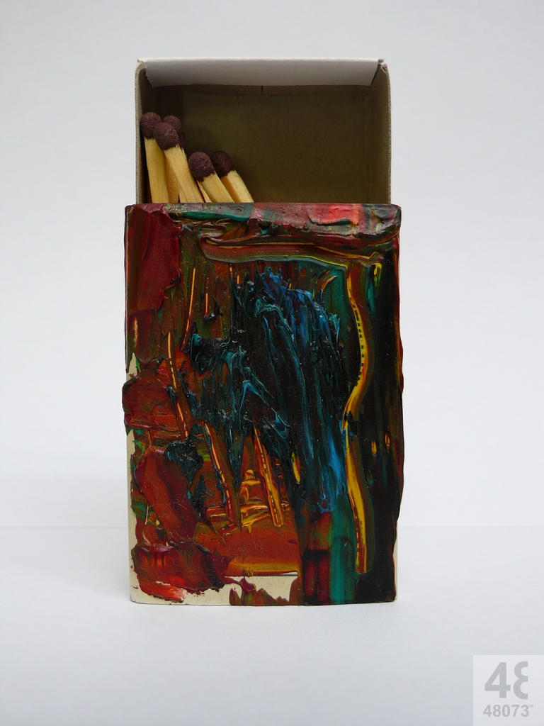 Small abstract painting on matchbox.