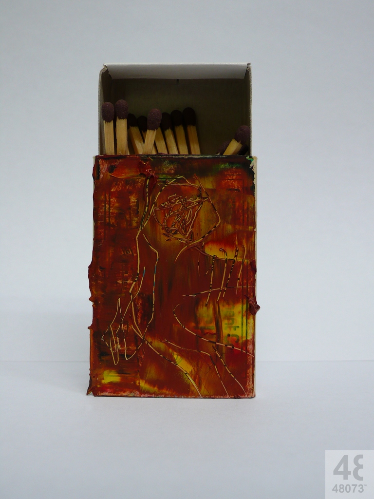 Small abstract painting on matchbox.