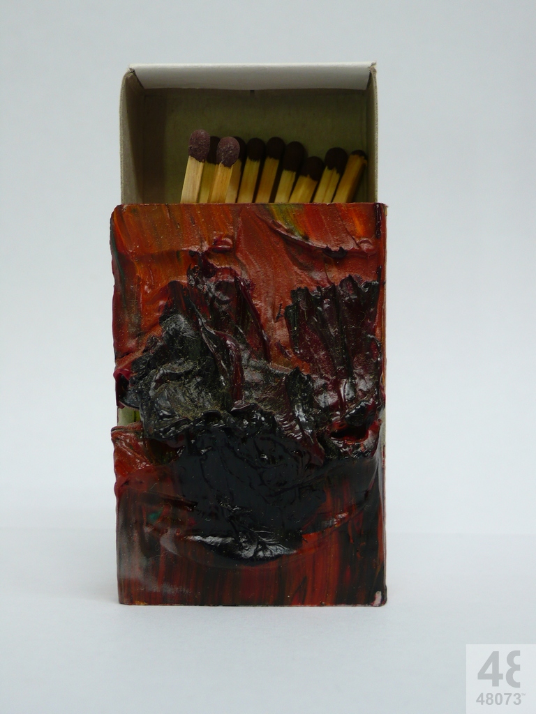 Small abstract painting on matchbox.