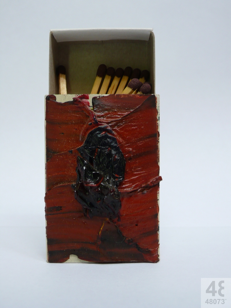 Small abstract painting on matchbox.