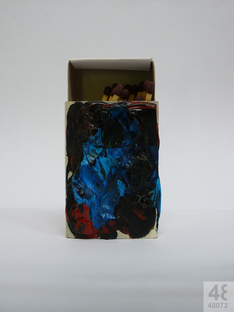 Small abstract painting on matchbox.