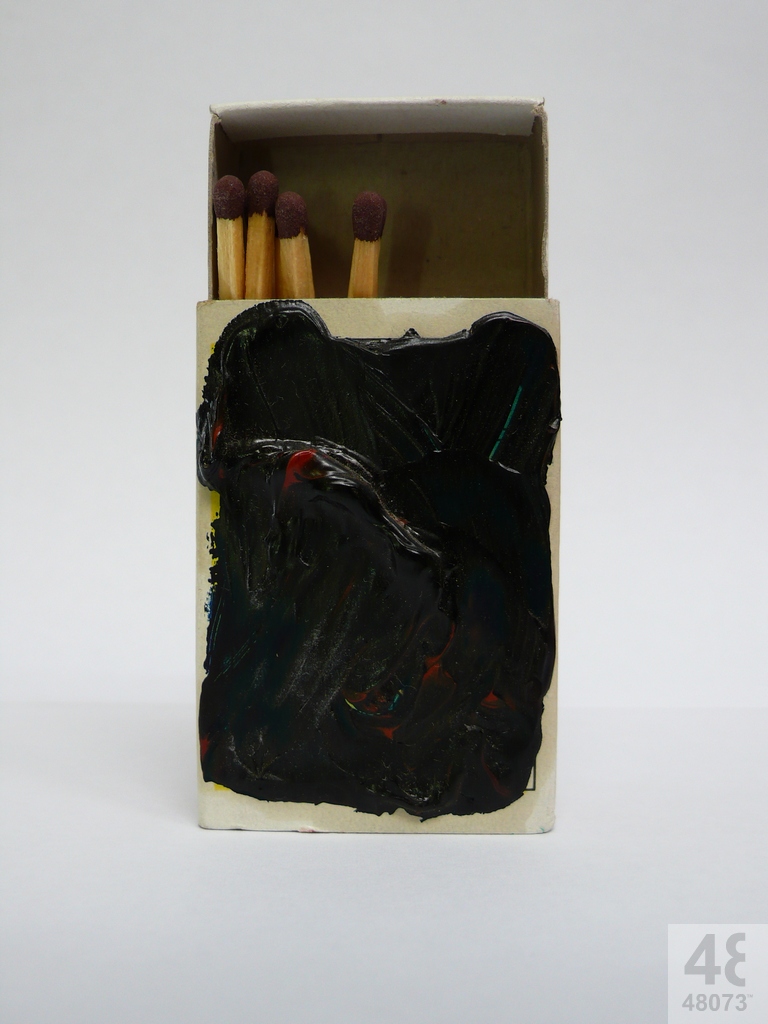 Small abstract painting on matchbox.