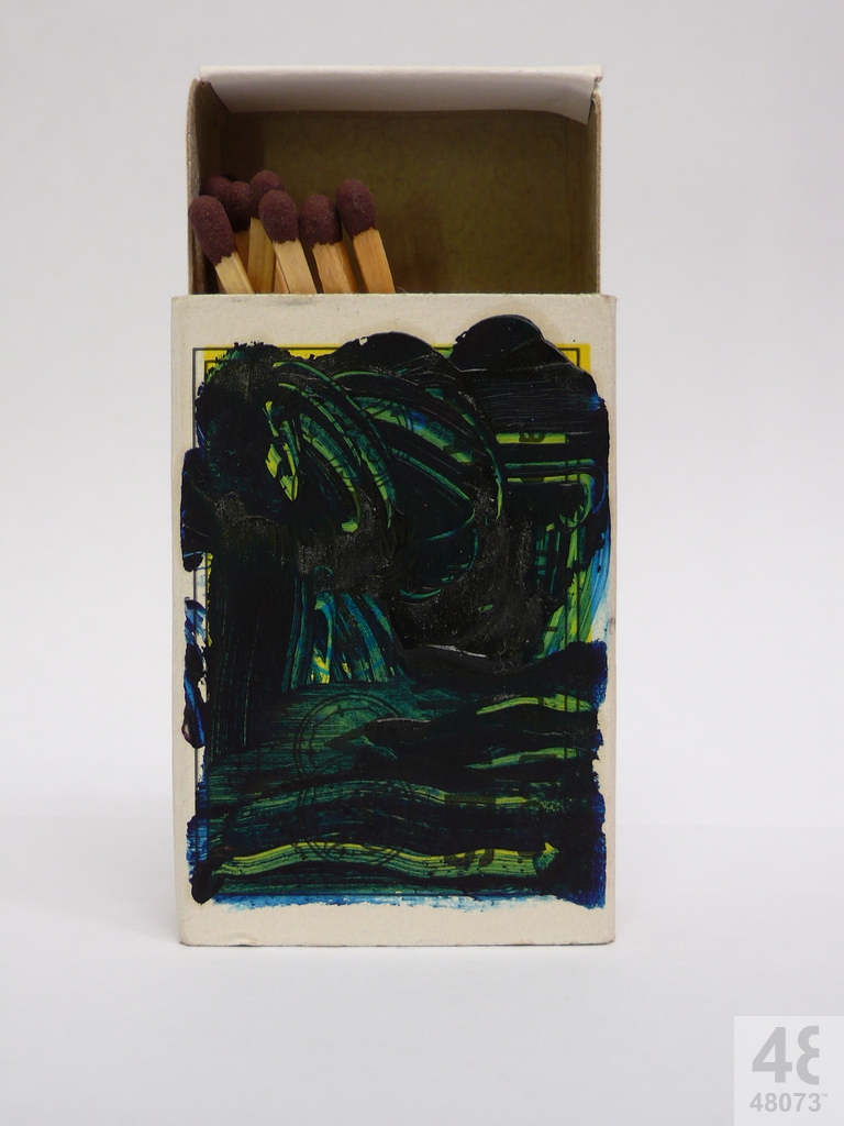 Small abstract painting on matchbox.