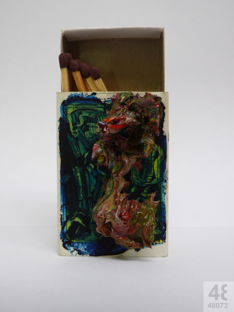 Small abstract painting on matchbox.