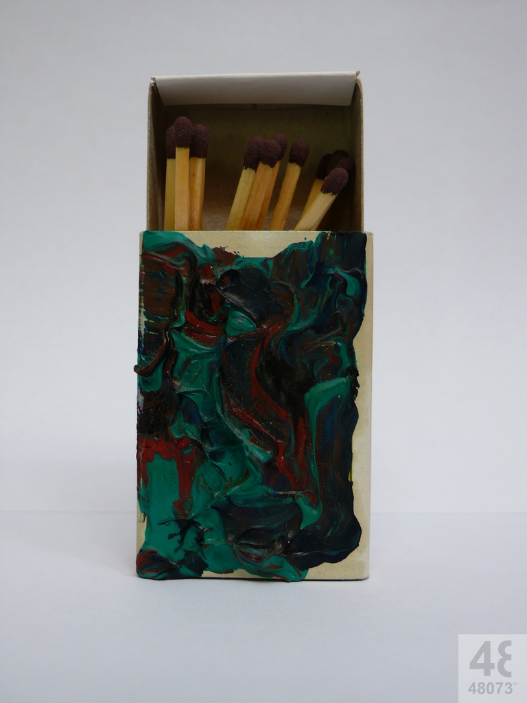 Small abstract painting on matchbox.