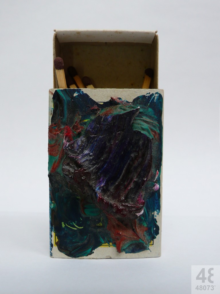 Small abstract painting on matchbox.