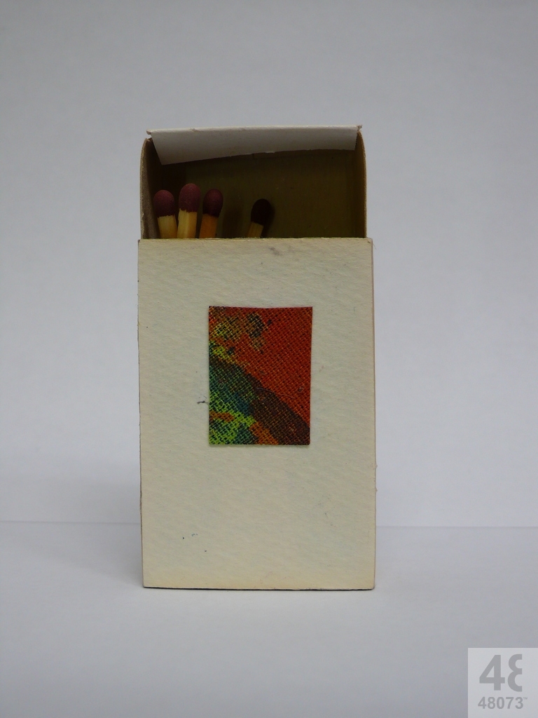 Small abstract painting on matchbox.