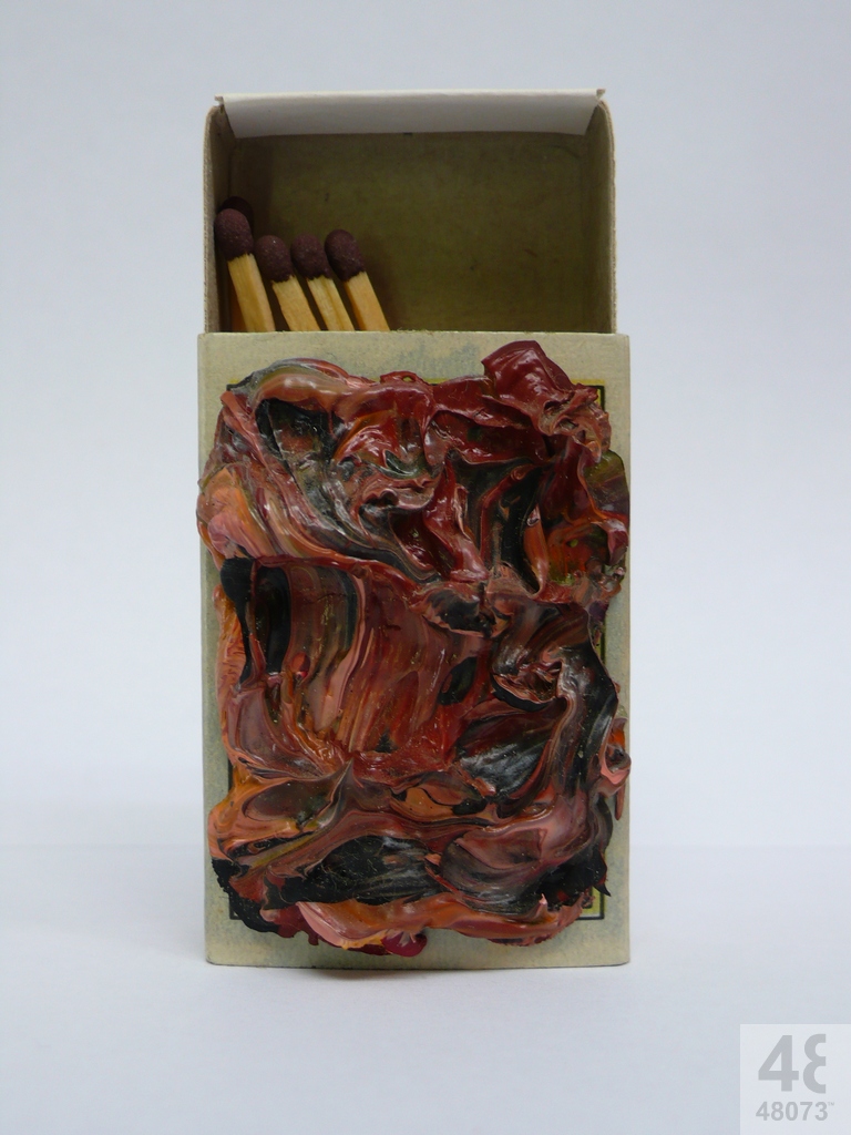 Small abstract painting on matchbox.