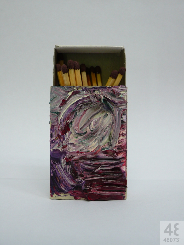Small abstract painting on matchbox.