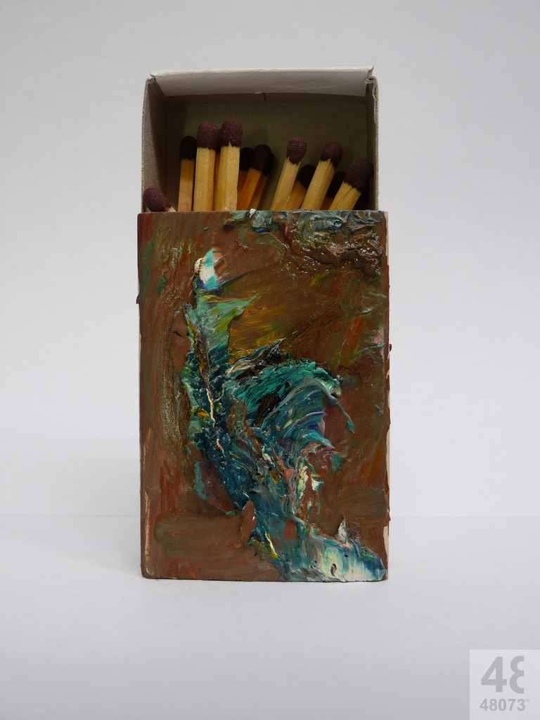 Small abstract painting on matchbox.