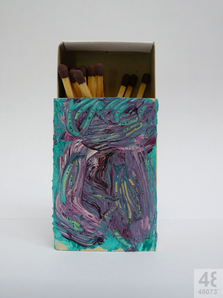 Small abstract painting on matchbox.