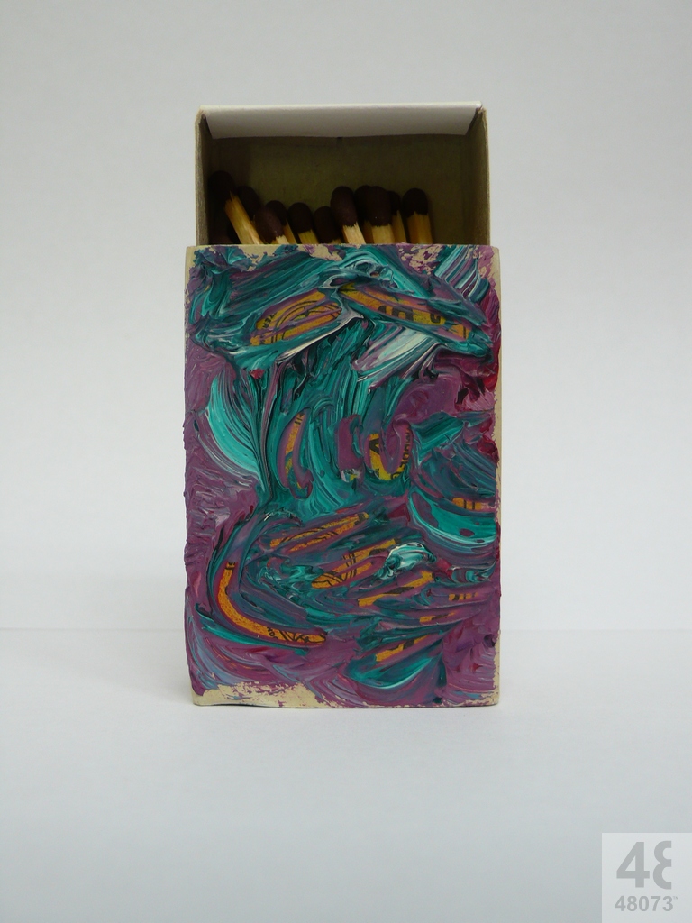 Small abstract painting on matchbox.