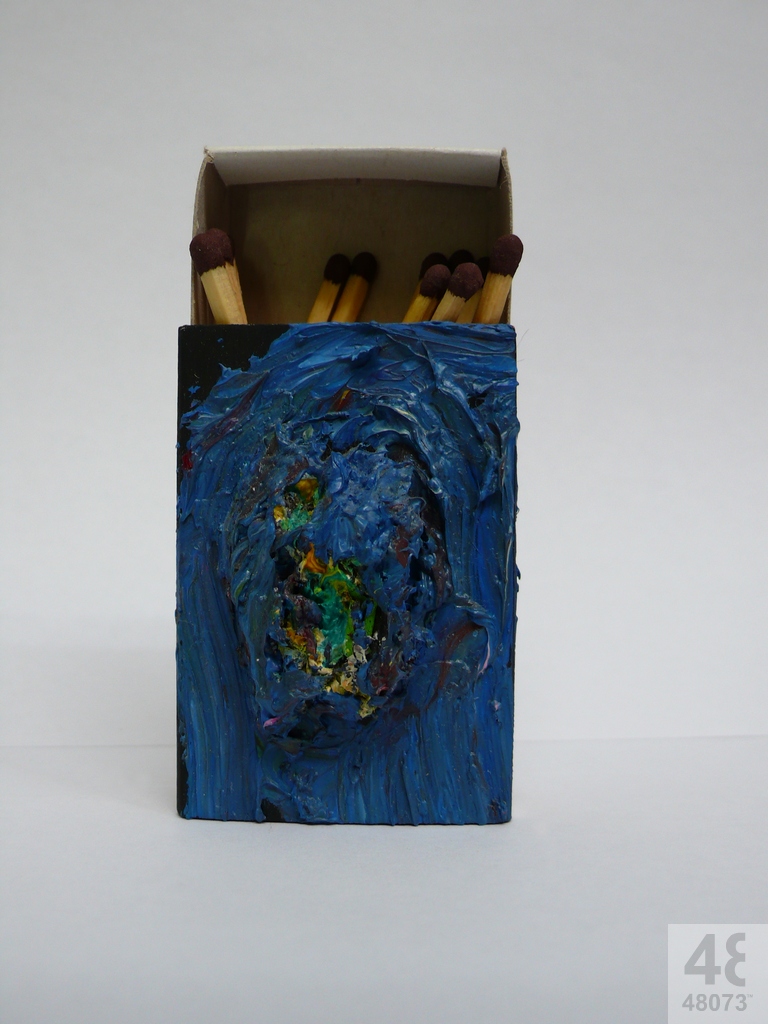 Small abstract painting on matchbox.