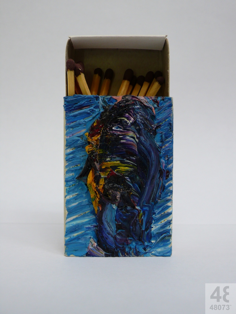 Small abstract painting on matchbox.