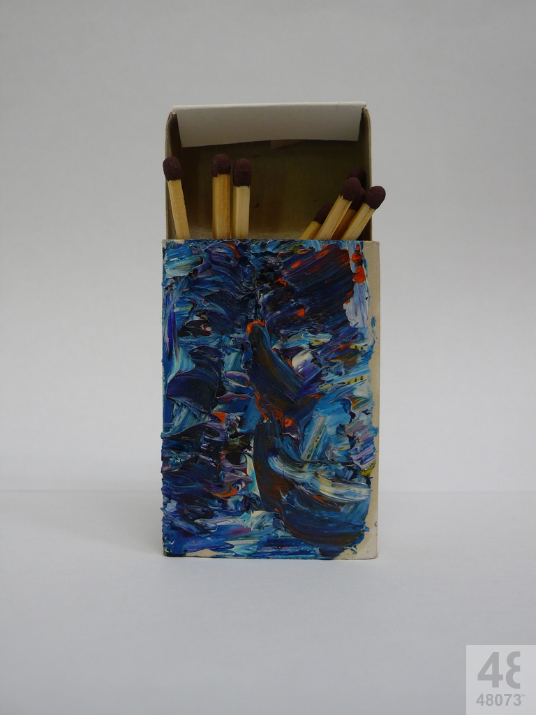 Small abstract painting on matchbox.