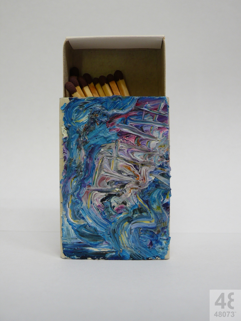 Small abstract painting on matchbox.