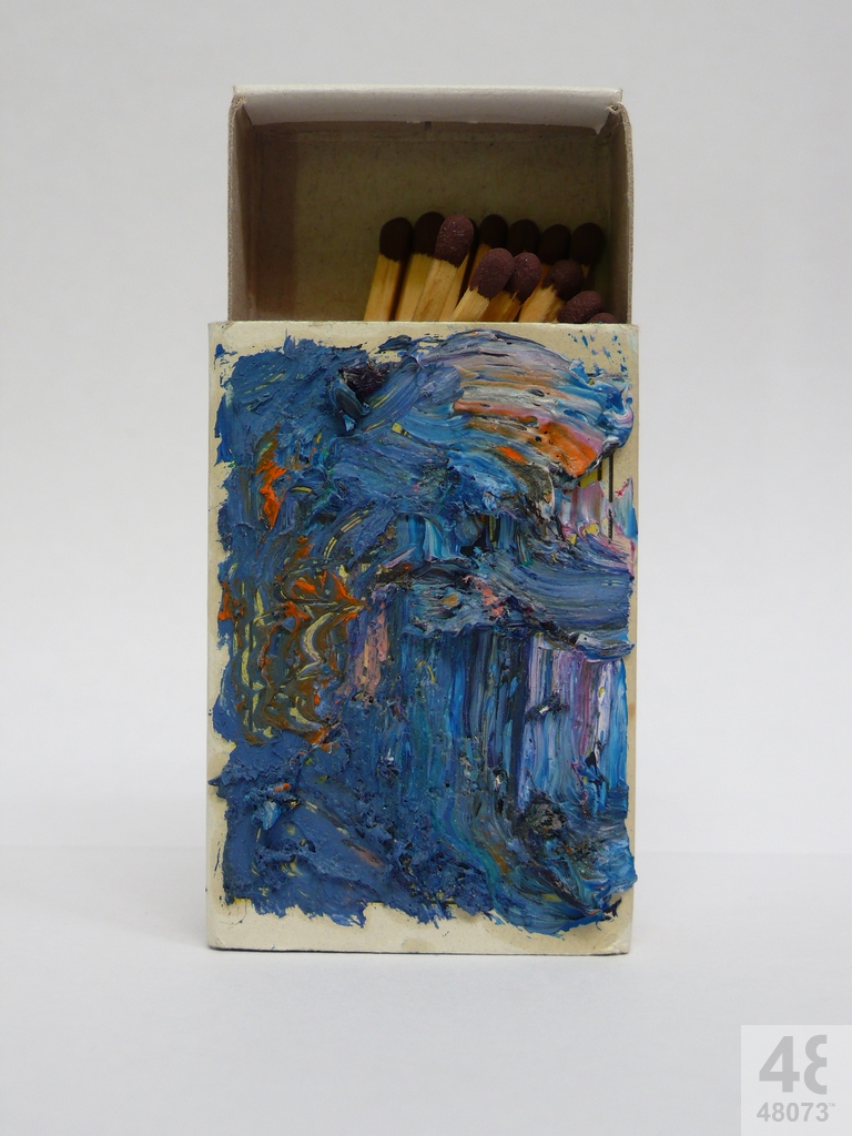 Small abstract painting on matchbox.