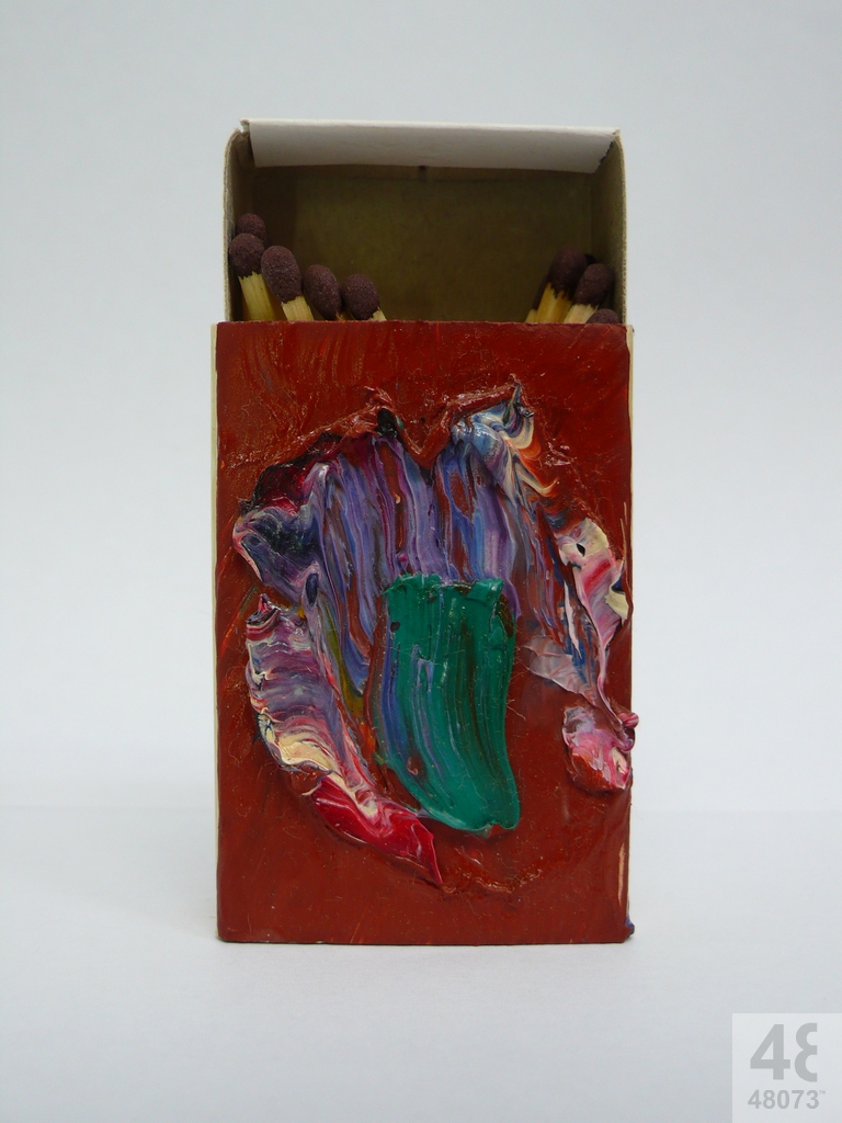 Small abstract painting on matchbox.