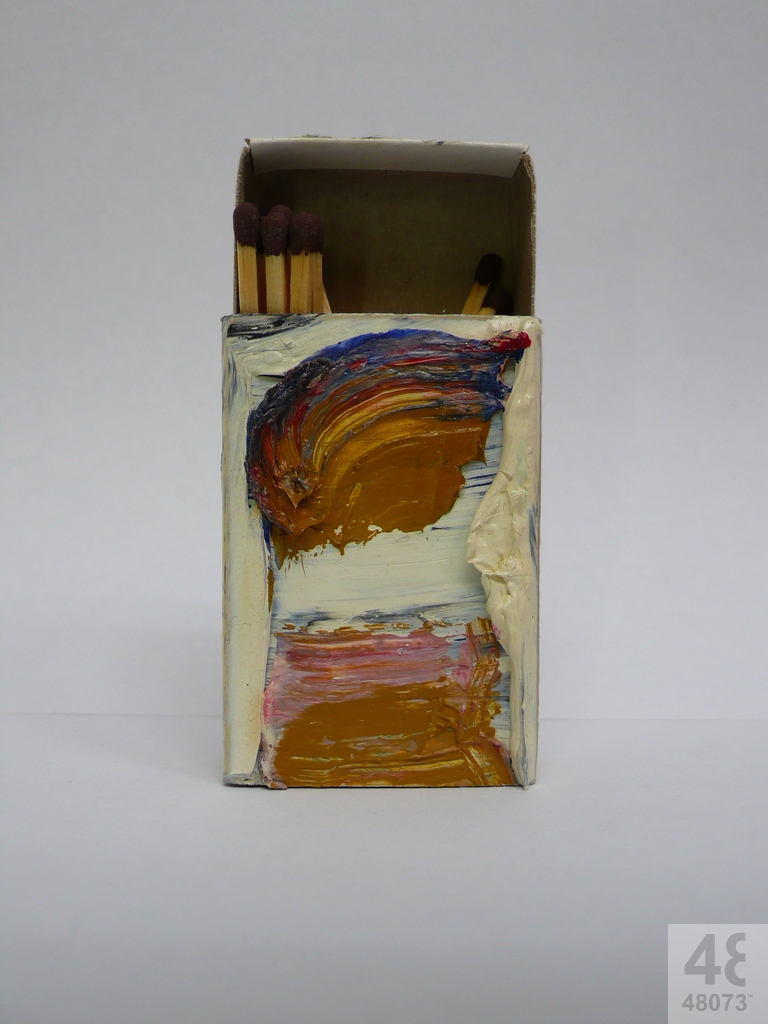 Small abstract painting on matchbox.