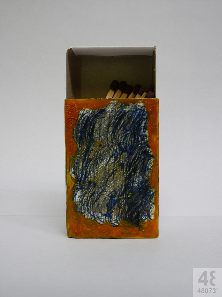 Small abstract painting on matchbox.