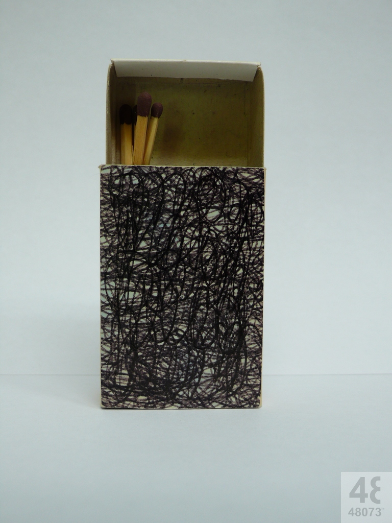 Small abstract painting on matchbox.