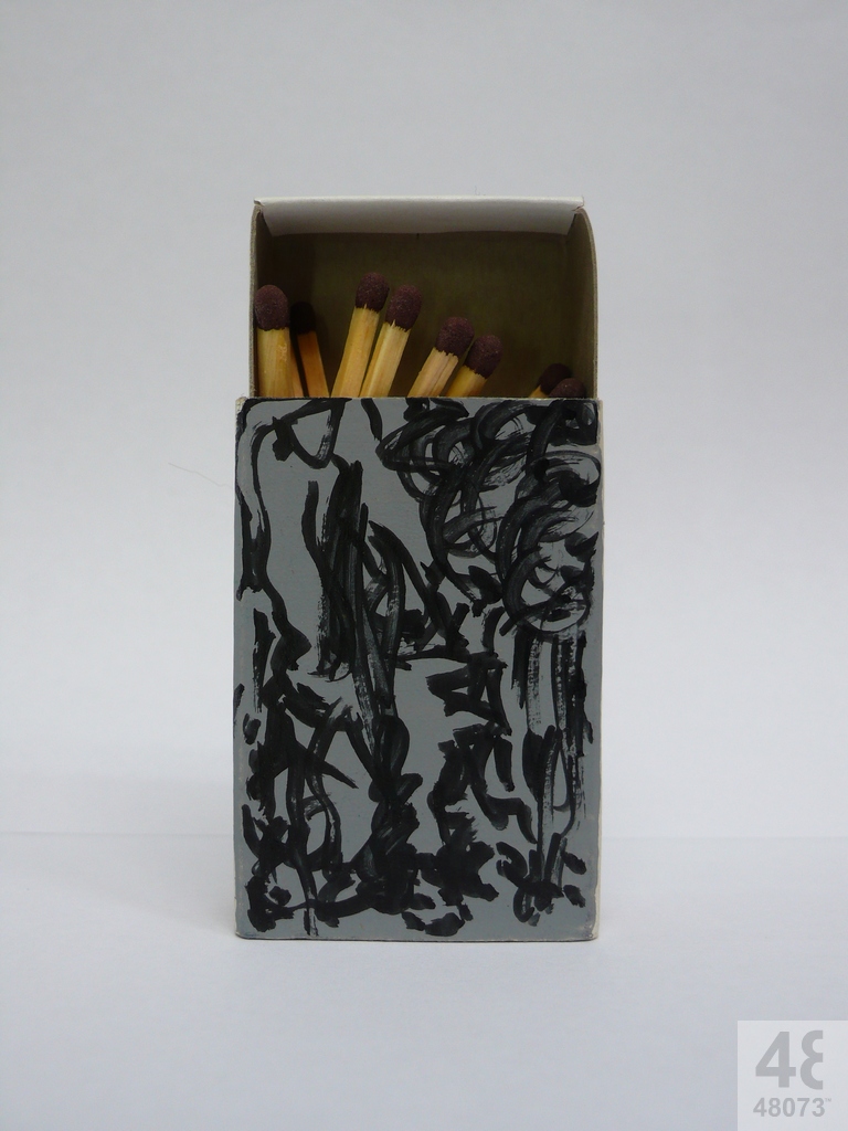 Small abstract painting on matchbox.