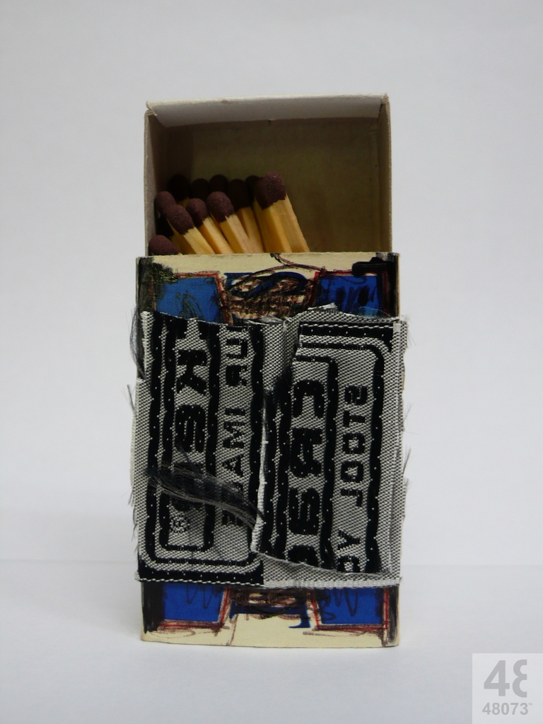 Small abstract painting on matchbox.