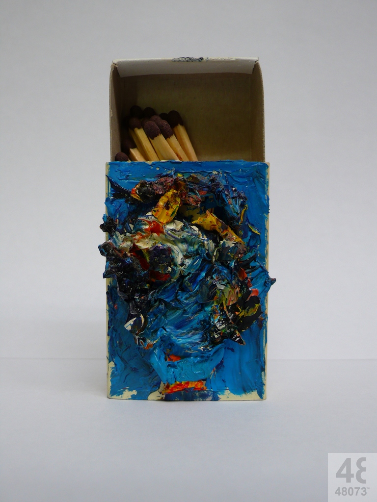 Small abstract painting on matchbox.