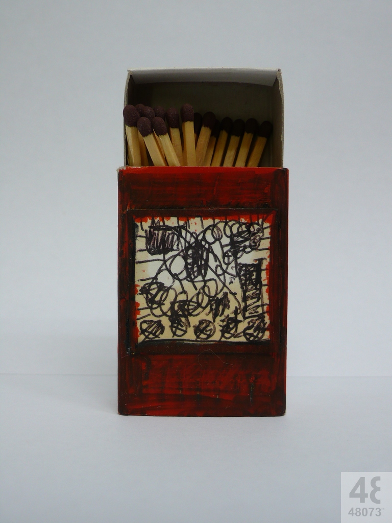 Small abstract painting on matchbox.