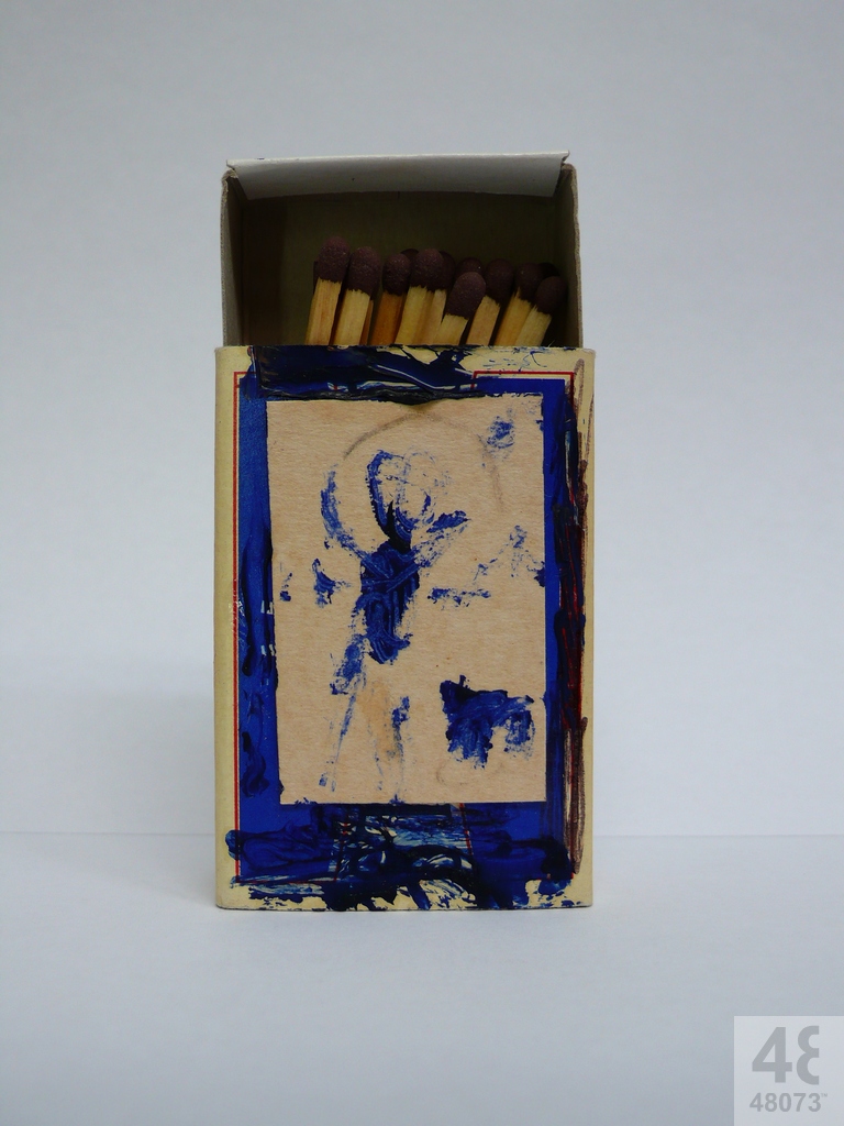 Small abstract painting on matchbox.