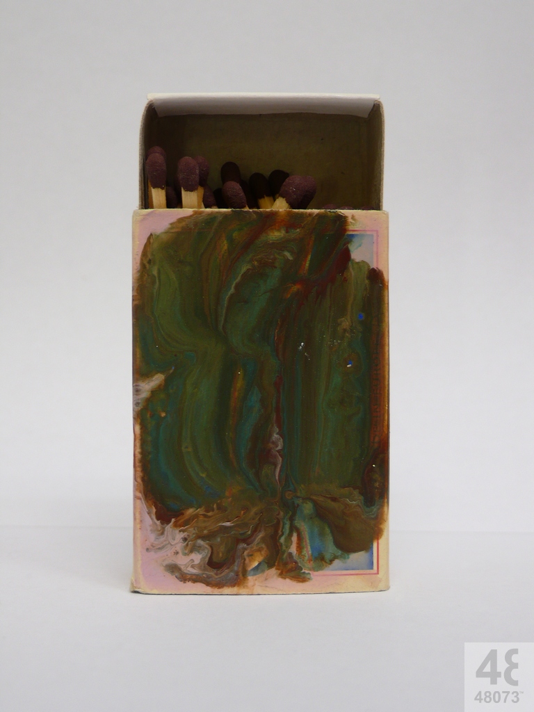 Small abstract painting on matchbox.