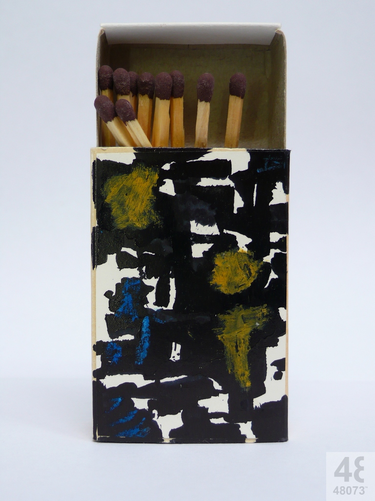 Small abstract painting on matchbox.