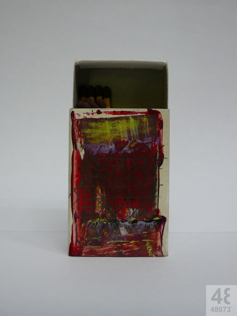 Small abstract painting on matchbox.