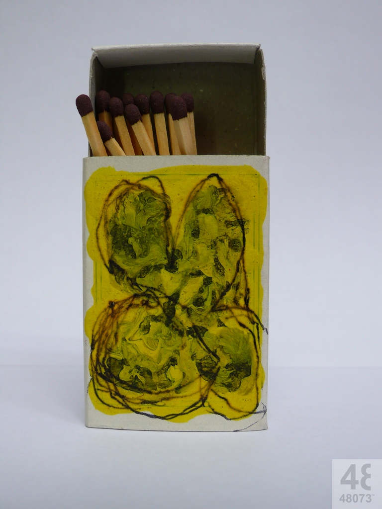 Small abstract painting on matchbox.