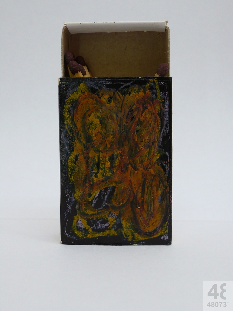 Small abstract painting on matchbox.