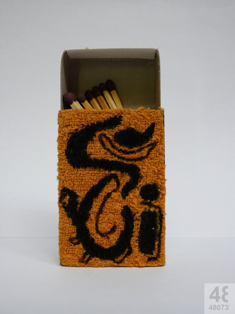 Small abstract painting on matchbox.