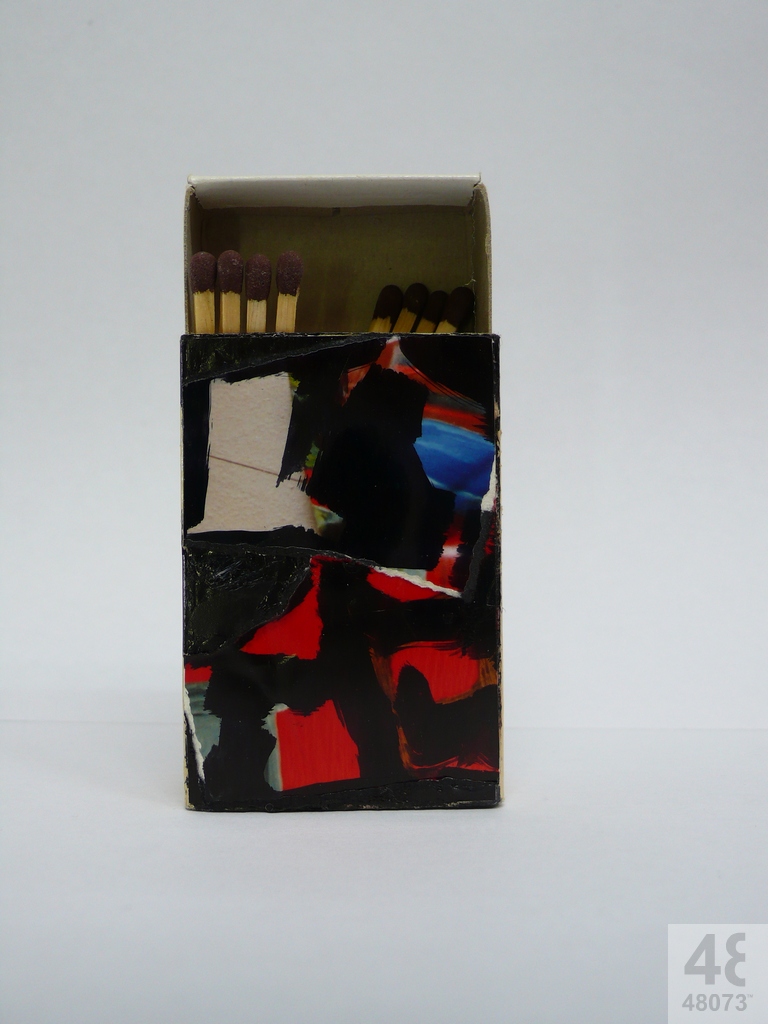 Small abstract painting on matchbox.