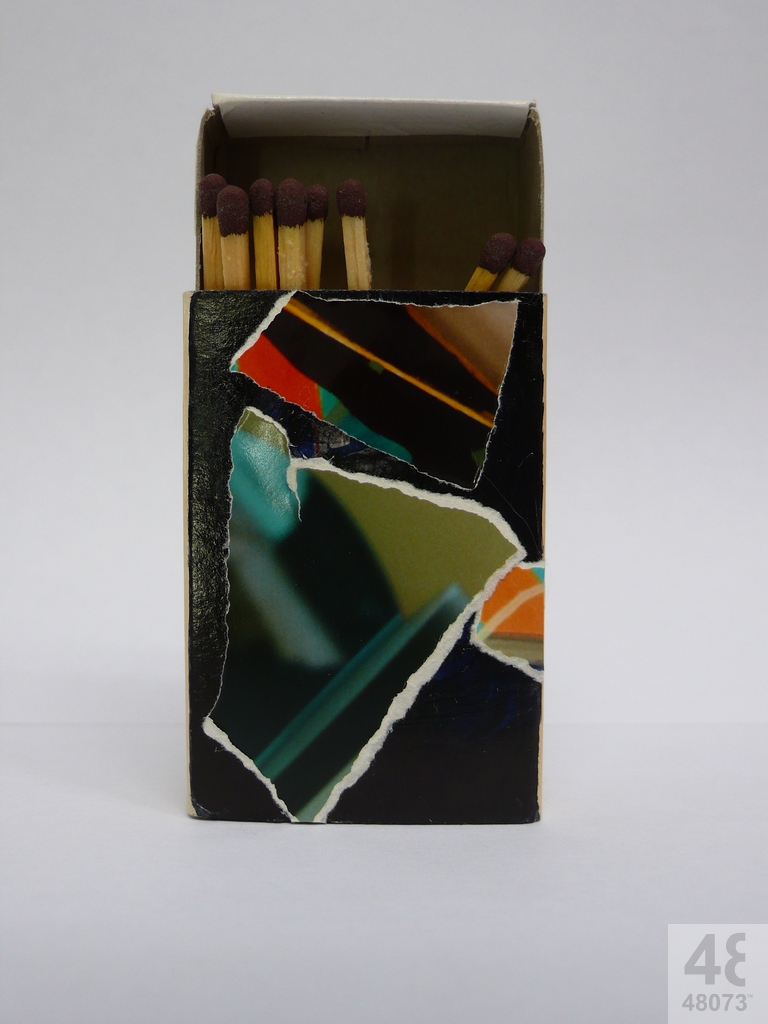 Small abstract painting on matchbox.