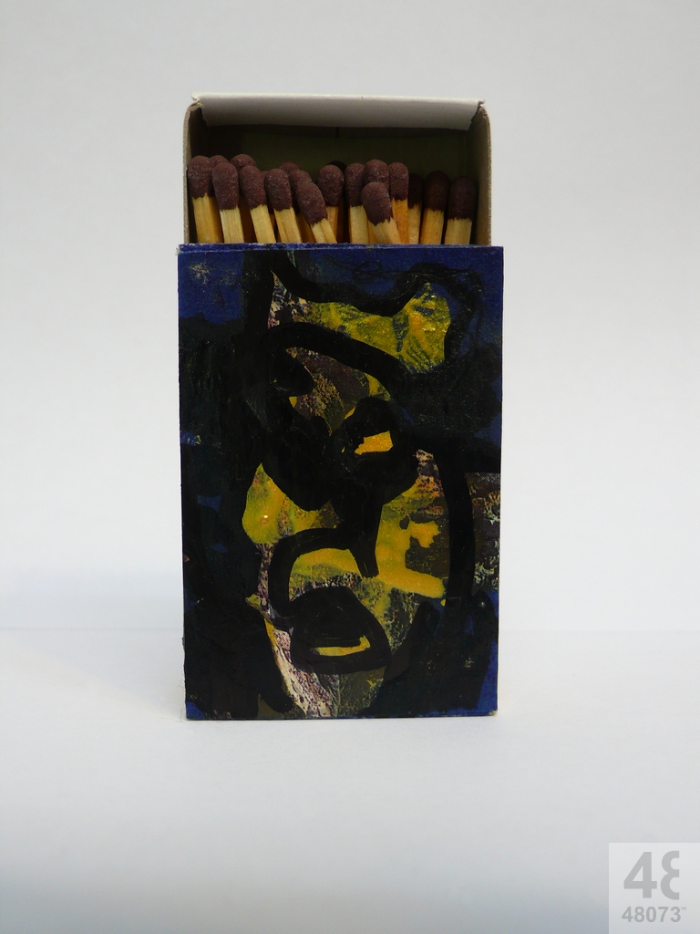 Small abstract painting on matchbox.