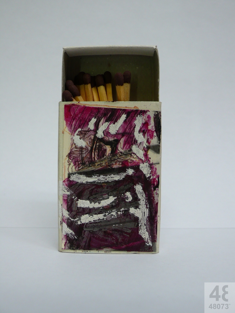 Small abstract painting on matchbox.