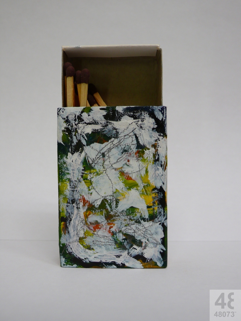 Small abstract painting on matchbox.