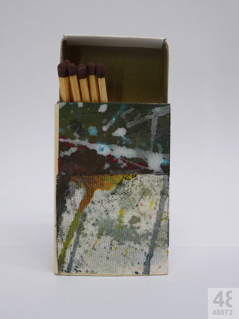 Small abstract painting on matchbox.