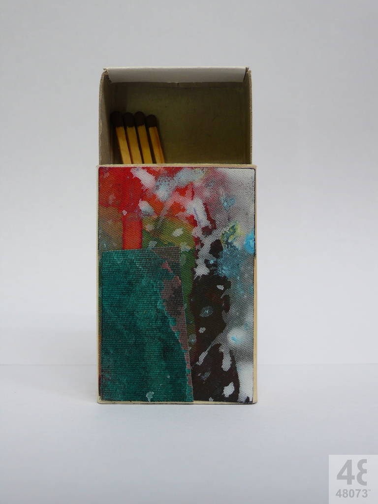 Small abstract painting on matchbox.