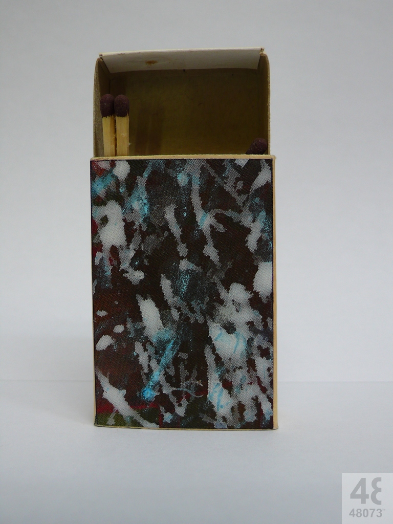 Small abstract painting on matchbox.