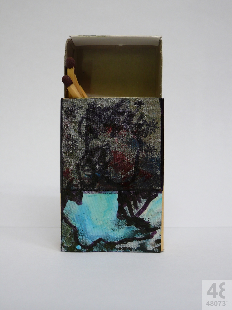 Small abstract painting on matchbox.