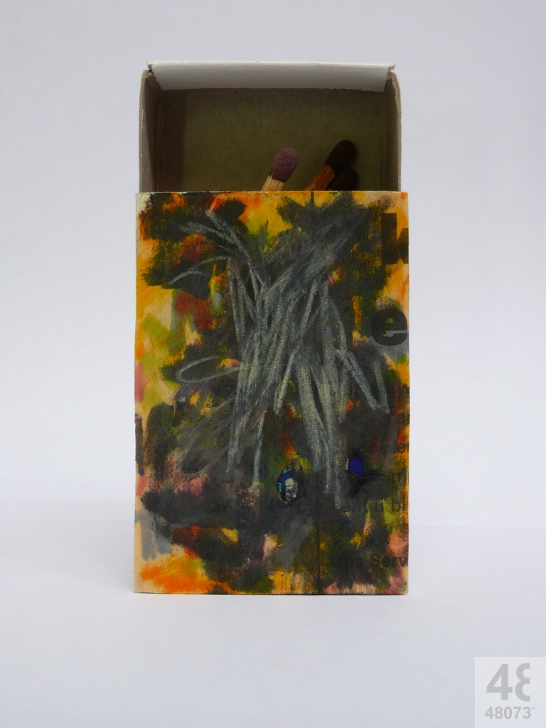 Small abstract painting on matchbox.